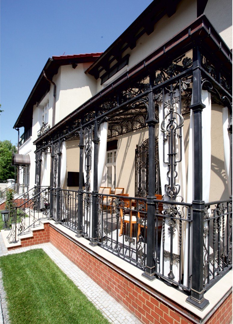 Forged metal, coated with hot zinc, painted