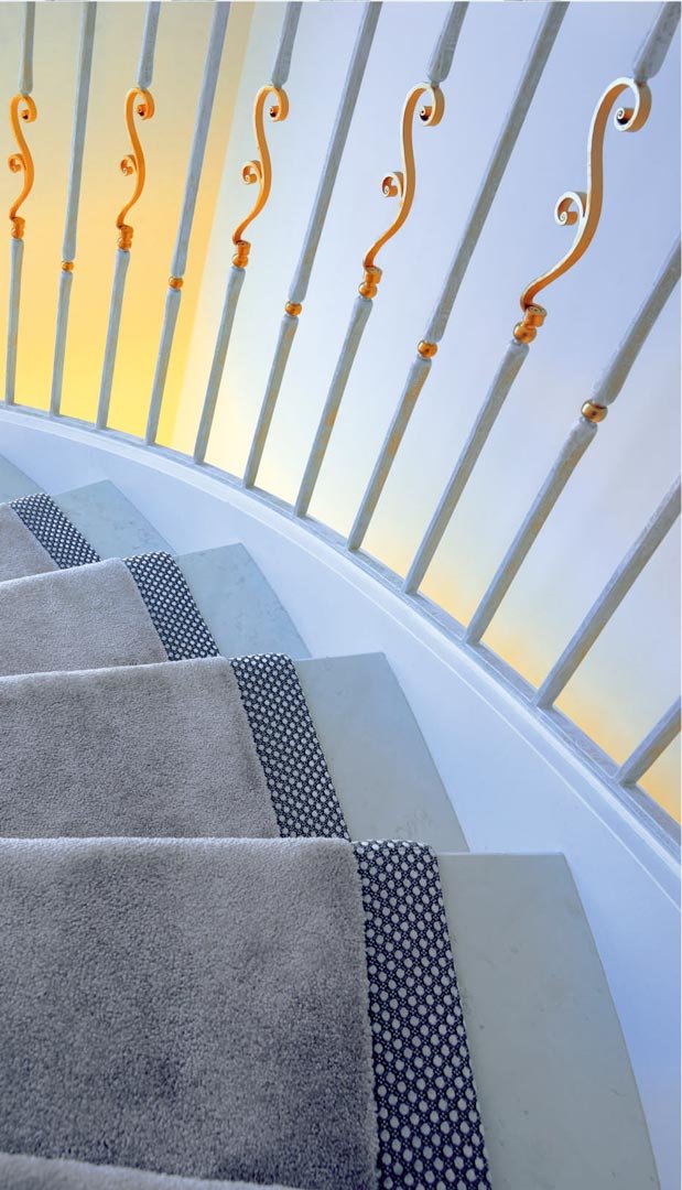 Steel constructions stairs, marble, forged metal, details coates with gold, wood armrest.